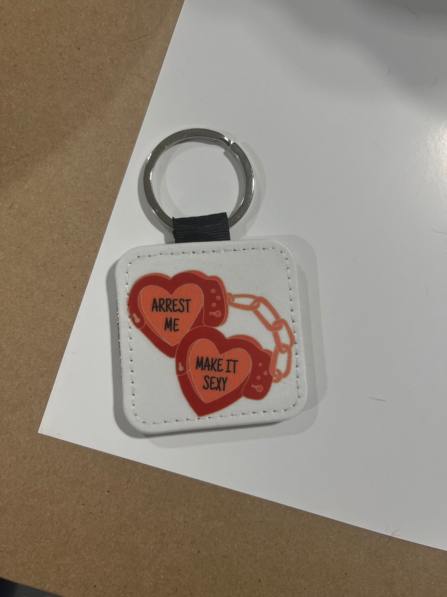 Arrest me keychain