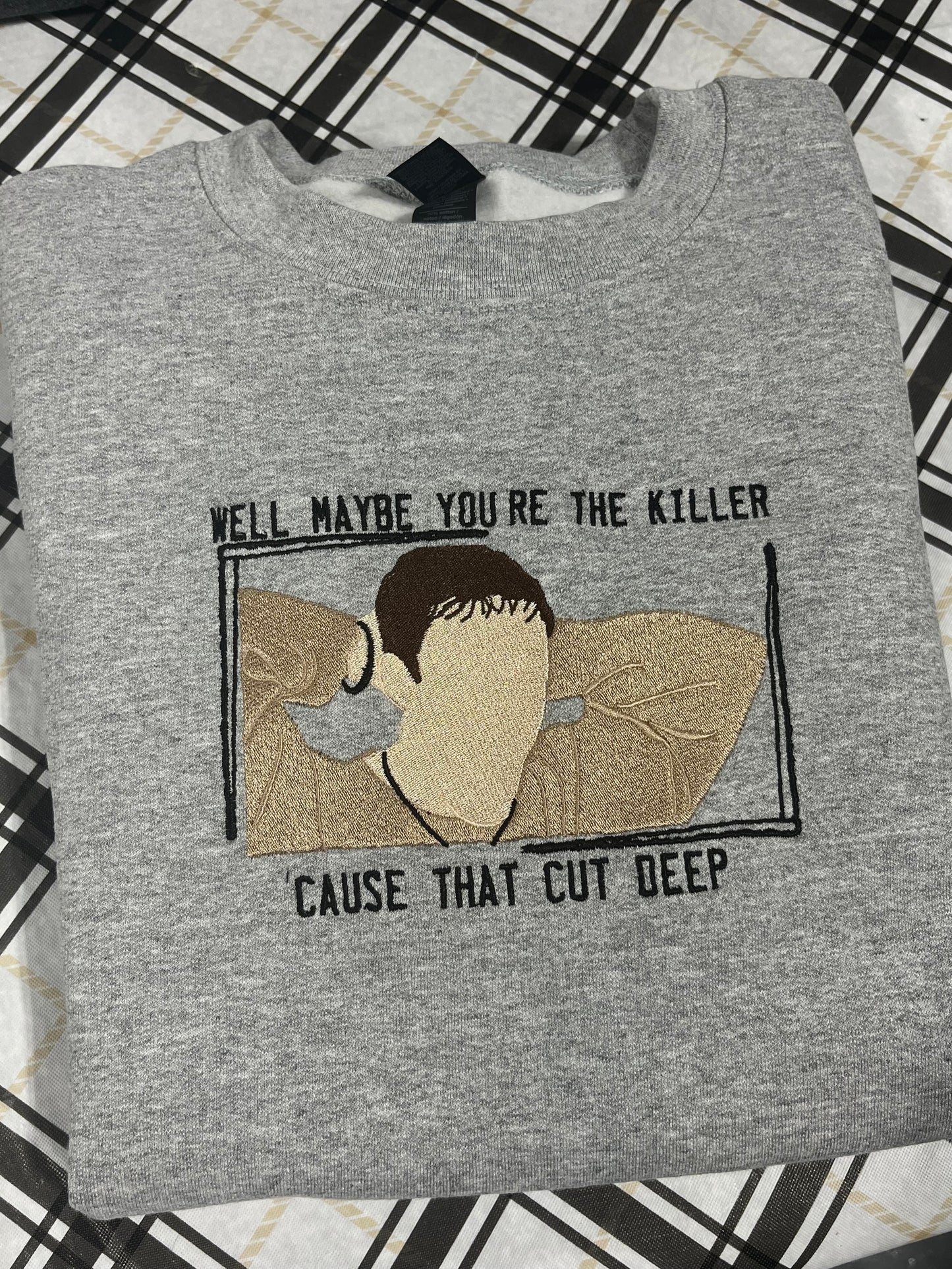 that cut deep embroidered crewneck