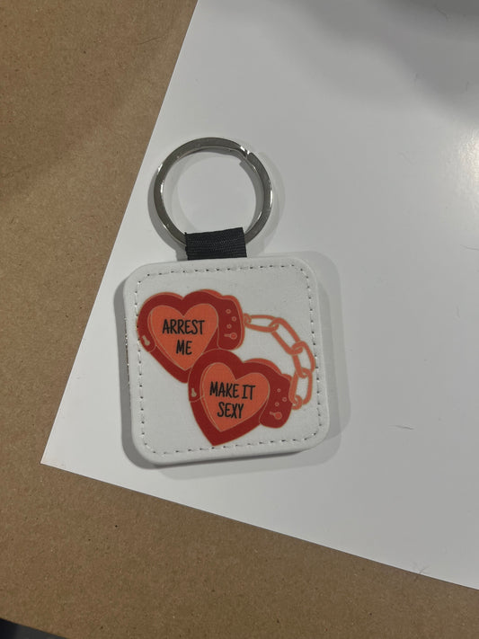 Arrest me keychain