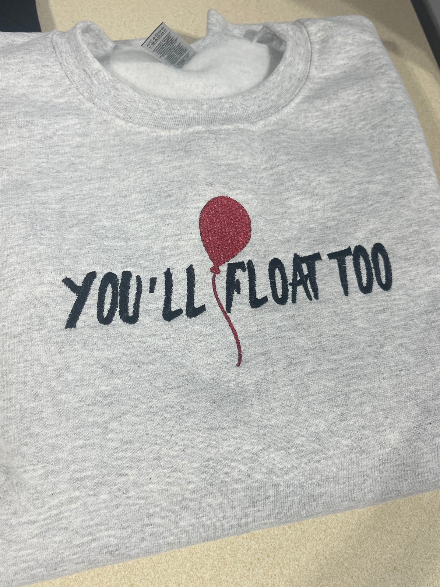 You’ll float too balloon Crewneck